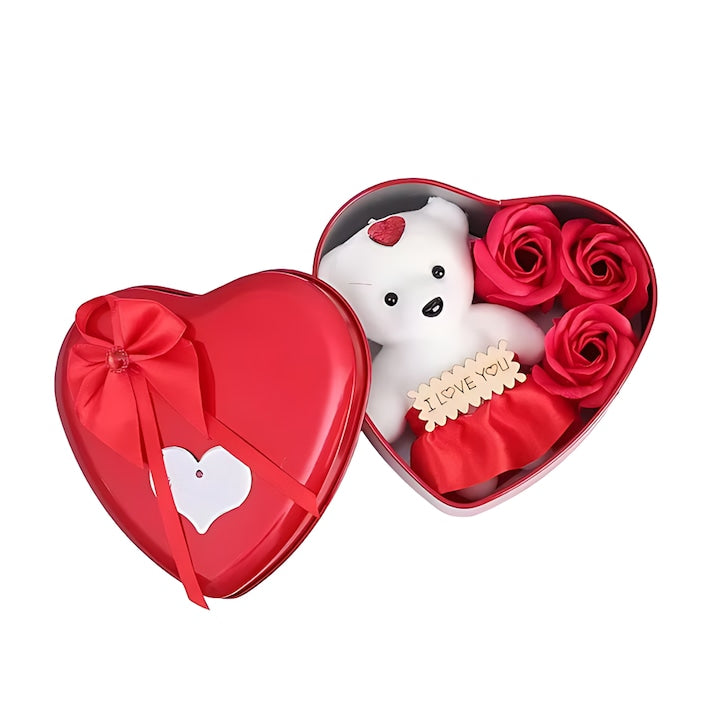Ursulet cu Trandafiri din Sapun Parfumati Teno®, cutie in forma de inimioara, mesaj pe tablita din lemn ”I LOVE YOU”, 3 trandafiri, fustita si cristal, rosu