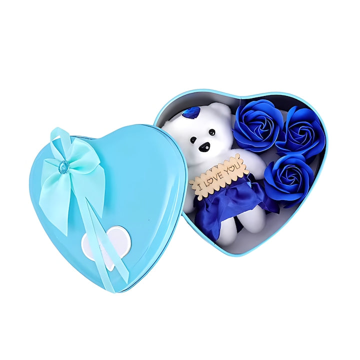 Ursulet cu Trandafiri din Sapun Parfumati Teno®, cutie in forma de inimioara, mesaj pe tablita din lemn ”I LOVE YOU”, 3 trandafiri, fustita si cristal, albastru