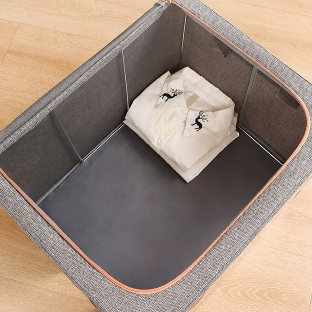 Cutie depozitare Macvi® 66L pliabila din material textil cu fermoar, fereastra transparenta si cadru metalic, organizator incapator pentru haine si articole casnice