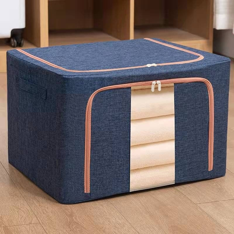 Cutie depozitare Macvi® 66L pliabila din material textil cu fermoar, fereastra transparenta si cadru metalic, organizator incapator pentru haine si articole casnice