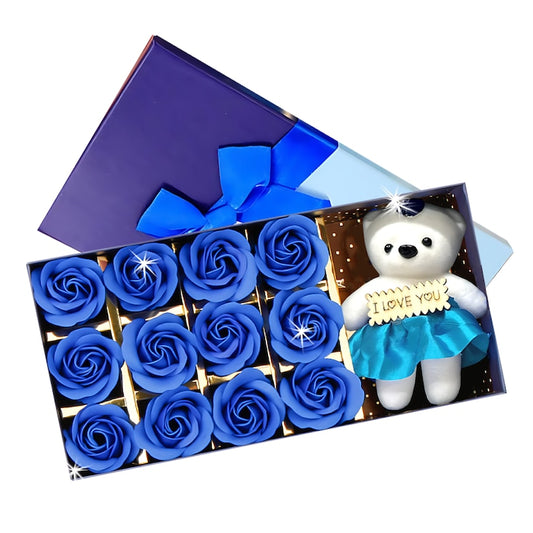 Ursulet cu Trandafiri din Sapun Teno®, cutie in forma patrata cu buline, mesaj pe tablita din lemn ”I LOVE YOU”, 12trandafiri, fustita si cristal, albastru regal