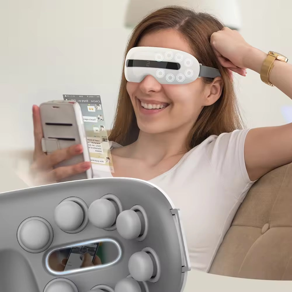 Aparat de masaj pentru ochi Macvi® cu 4 moduri de relaxare 16 puncte de masaj Bluetooth compresie termica presopunctura perne de aer vibratii alb
