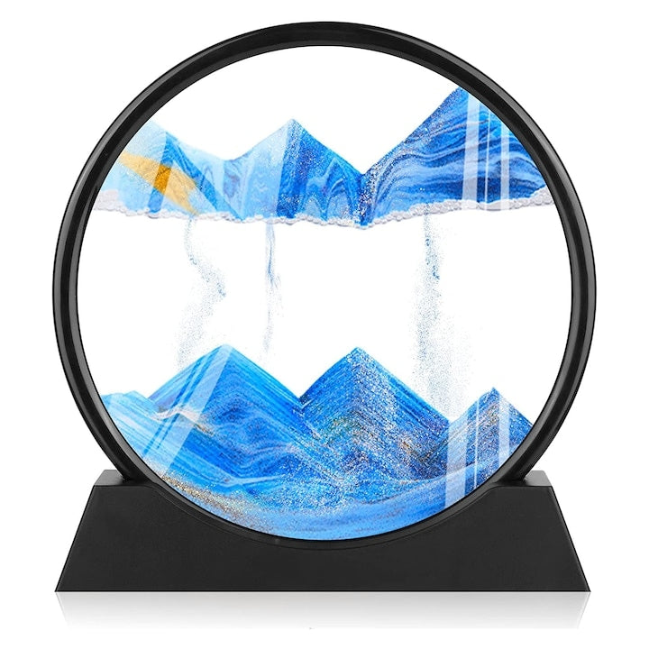 Obiect decorativ Macvi® cu efect 3D din nisip, masa rotativa 360°, baza din plastic, sticla si nisip, 18x19 cm, Albastru